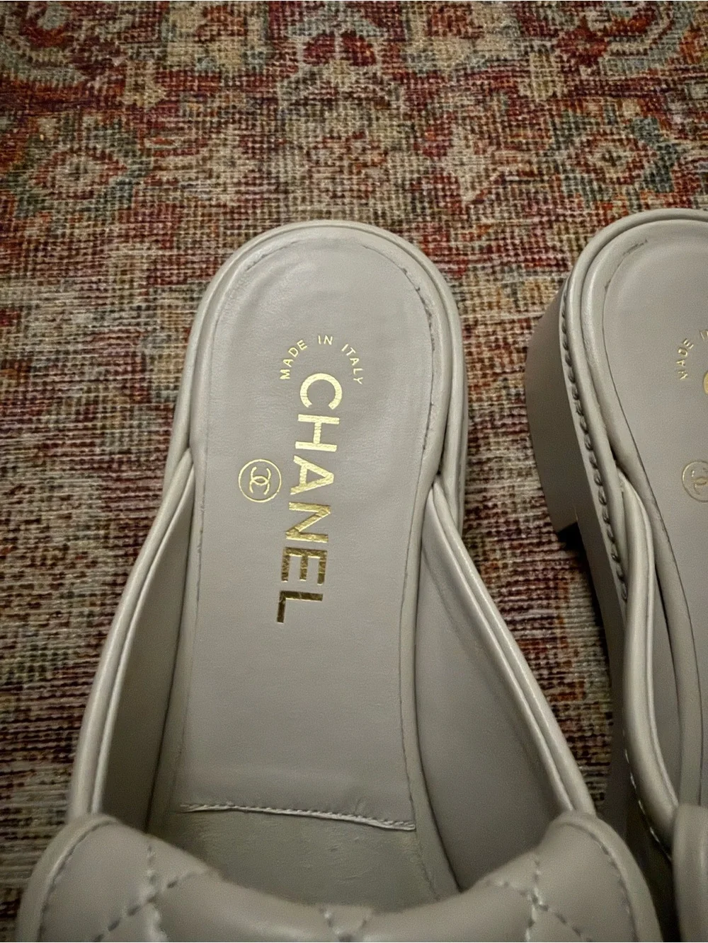 Chanel Quilted Leather Slide Mules in Light Gray with Gold CC